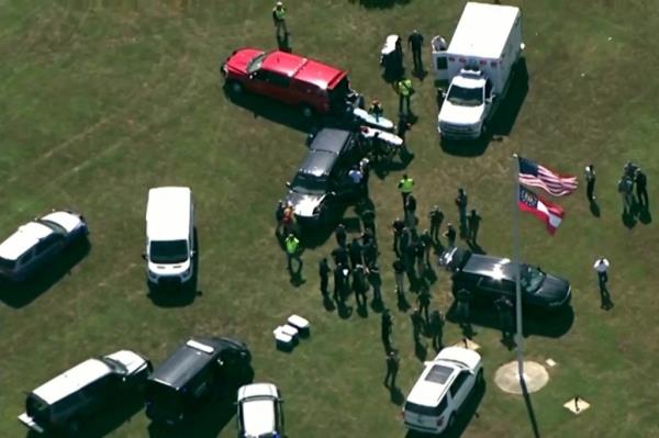 First responders gathered at the scene of a fatal shooting at Apalachee High School, Winder, Georgia, from an aerial perspective