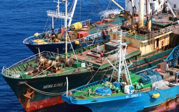 An illegal transshipment is seen taking place on board the ship 'Heng Xing 1' in an area of international waters near the exclusive economic zone of Indonesia.