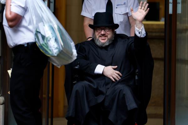 Nicholas Rossi departs Edinburgh Sheriff Court after his extradition hearing on July 12, 2023 in Edinburgh, Scotland. 