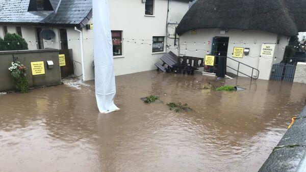 Midleton flood 'worst in living memory' as historic East Cork pub under metre of water