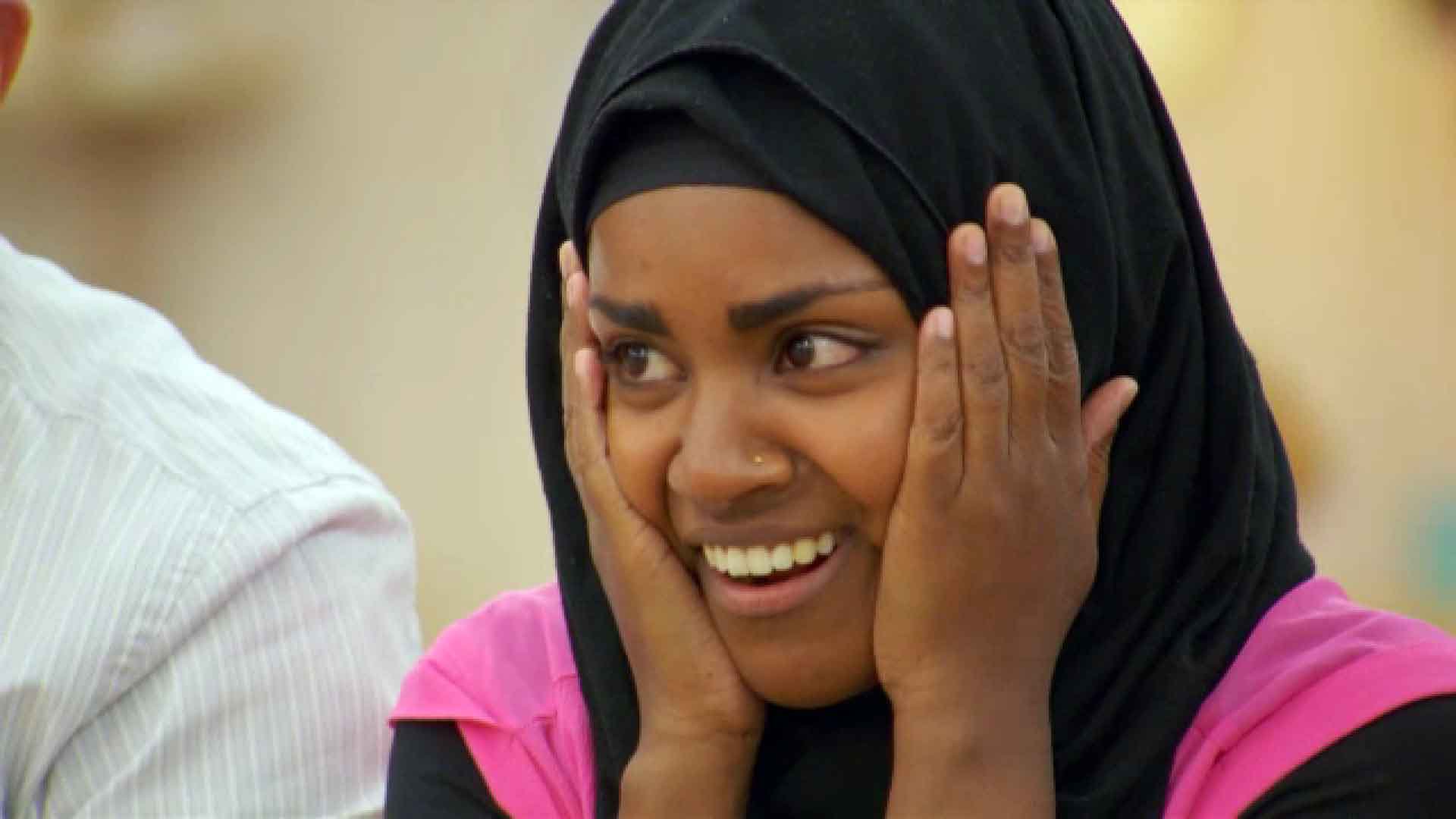 Bake Off winner Nadiya Hussain with her head in her hands