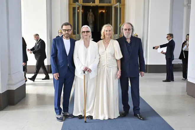 ABBA receive the Royal Vasa Order from Sweden's King Carl Gustaf and Queen Silvia at a ceremony at Stockholm Royal Palace, May 31