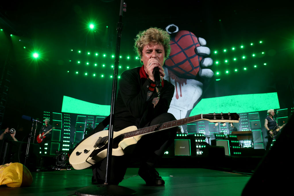 Green Day performs on stage