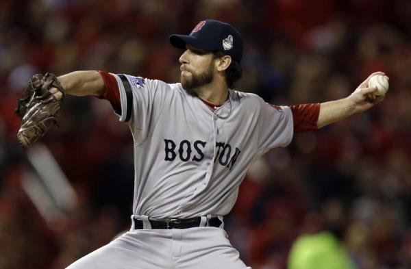 Boston Red Sox relief pitcher Craig Breslow throws during the seventh inning of Game 3 of baseball's World Series against the St. Louis Cardinals Saturday, Oct. 26, 2013, in St. Louis. (AP Photo/Jeff Roberson)