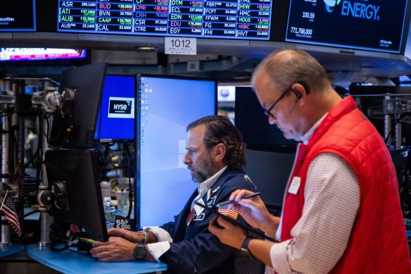 Traders on the floor of the New York Stock Exchange. The market is awaiting the latest US inflation figures.