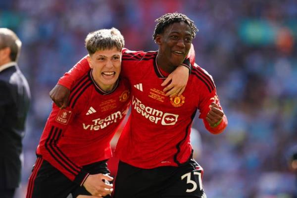 Alejandro Garnacho (left) and Kobbie Mainoo (right) celebrate Manchester United's FA Cup win